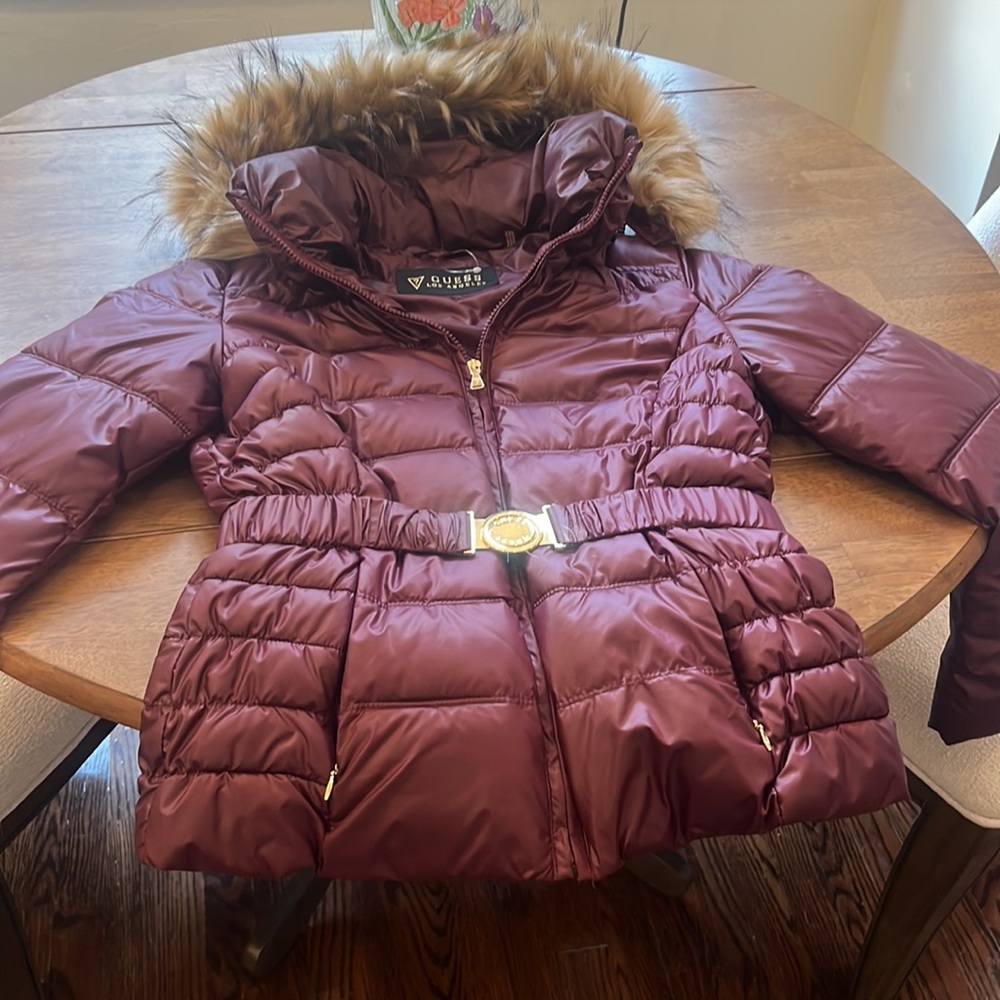 Women’s size medium, burgundy quilted Guess jacket.